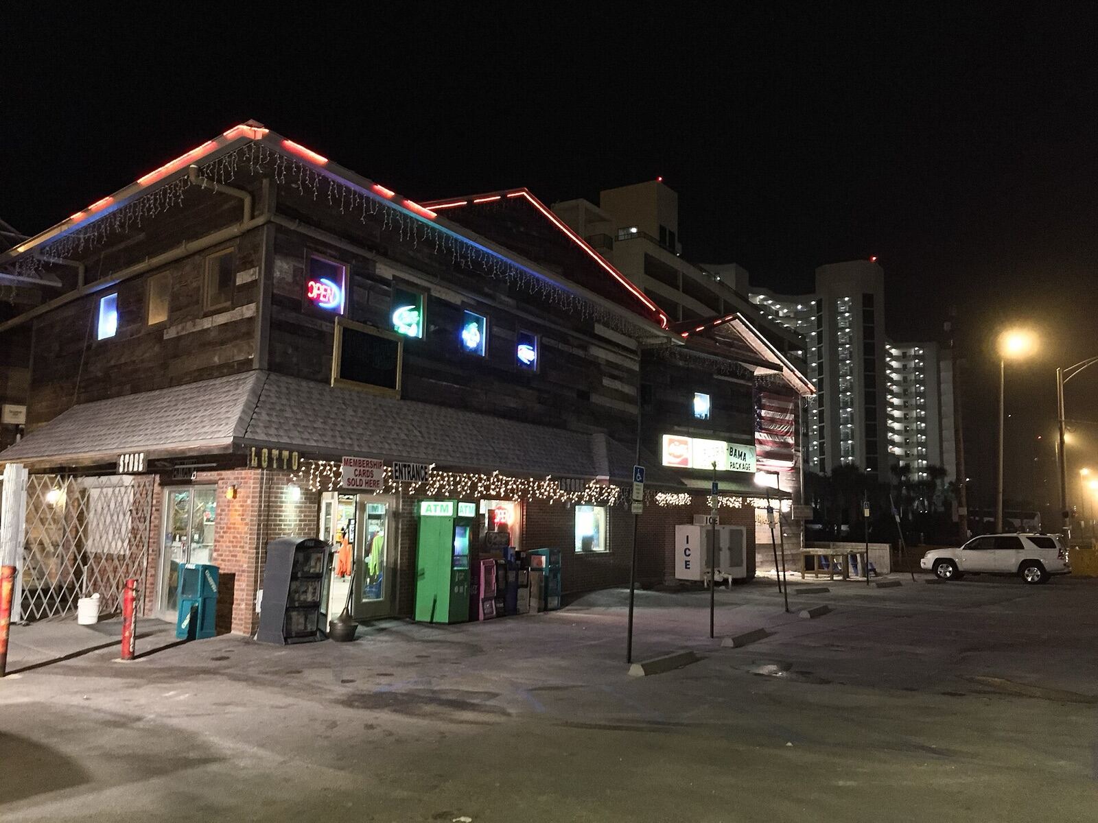 The Flora-Bama bar lit up at night on the Alabama–Florida state line