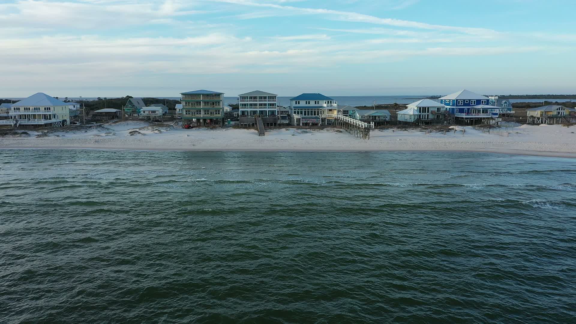 Aerial view of beachfront homes along the Fort Morgan beach in Alabama