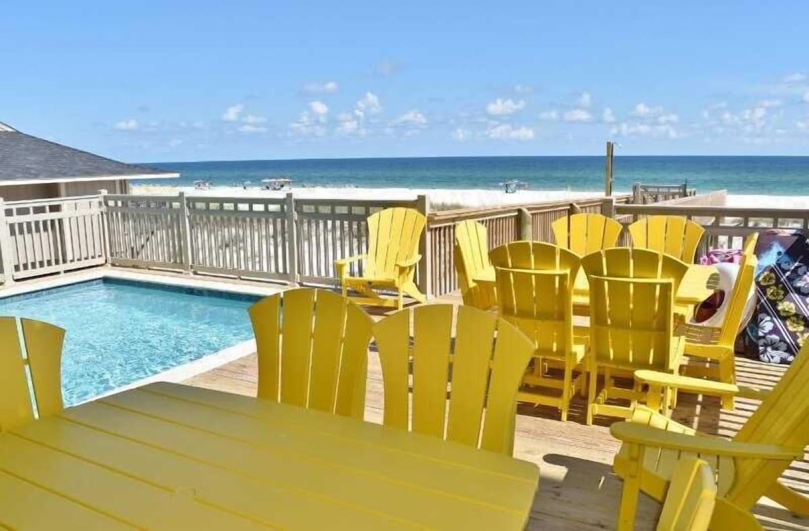Covered beachfront dining porch set for dinner
