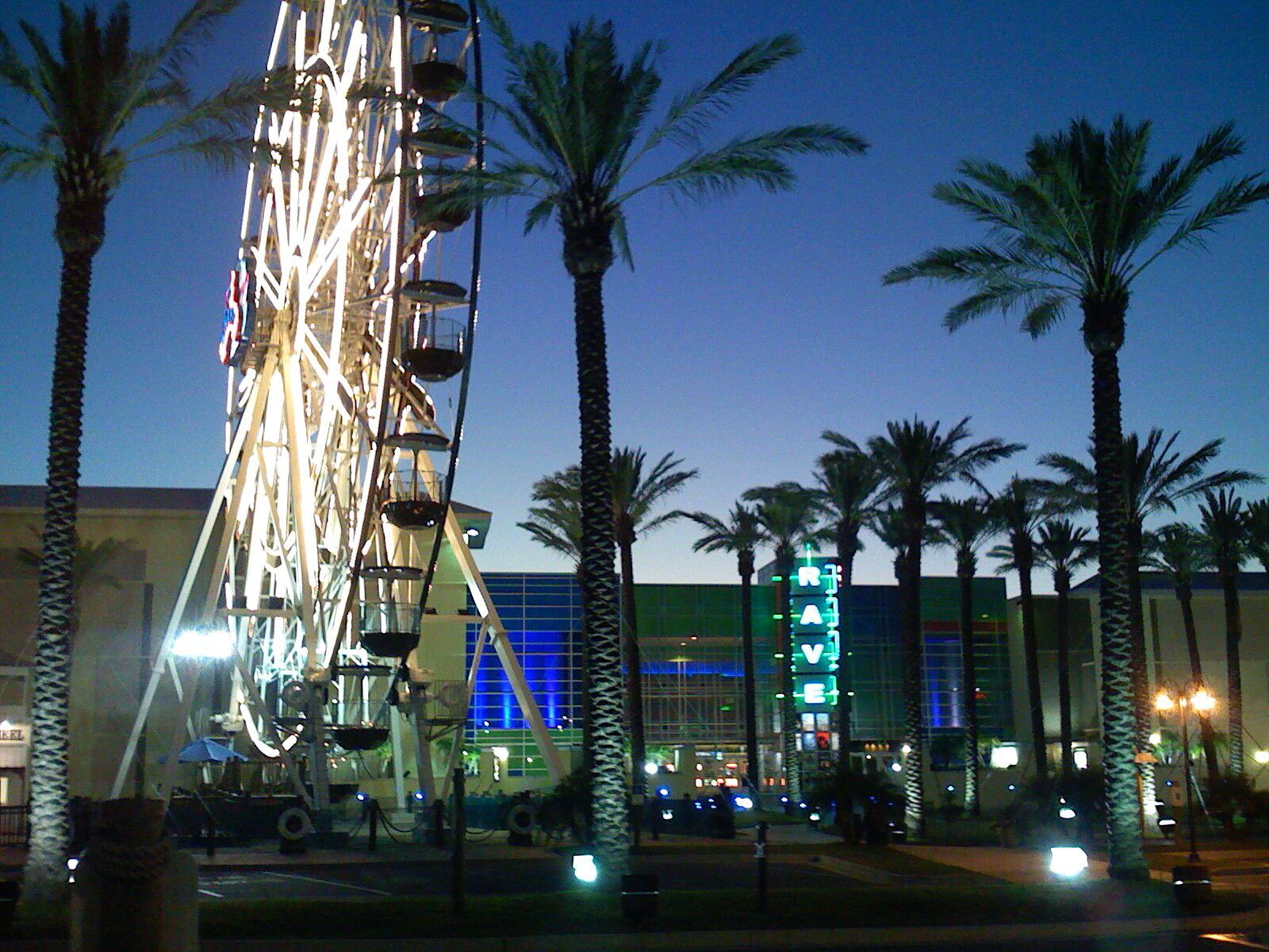 The Wharf ferris wheel lit up at dusk near Gulf Shores